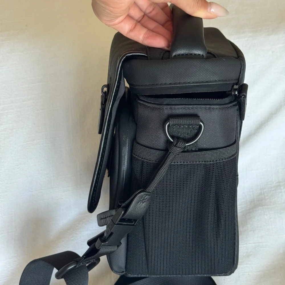 DJI Mavic Black Messenger Bag with Adjustable Strap and Minimalist Design